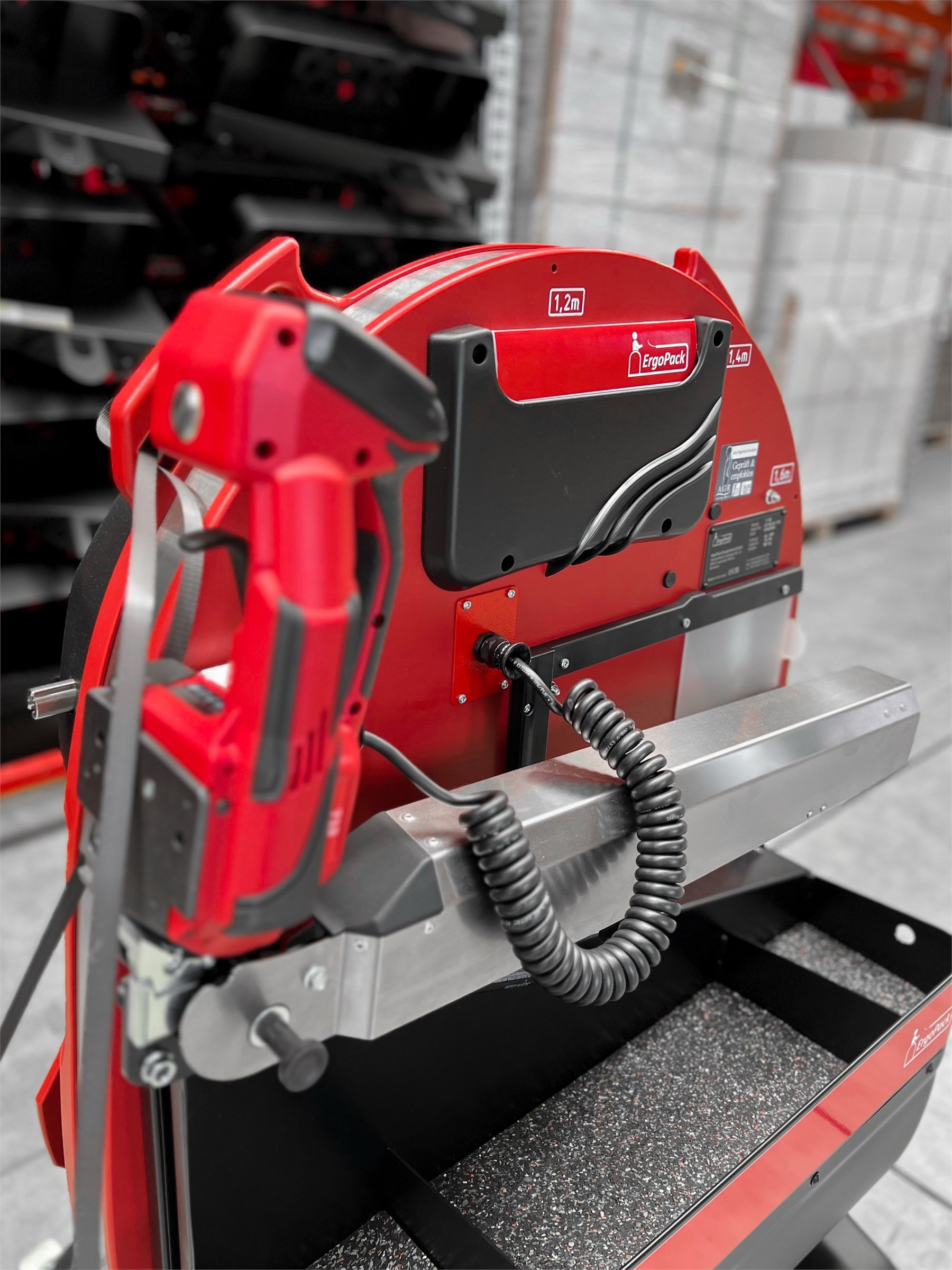 Improving dispatch worker safety by automating manual pallet strapping